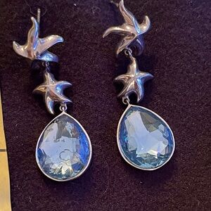 Sterling silver starfish earrings with blue stone